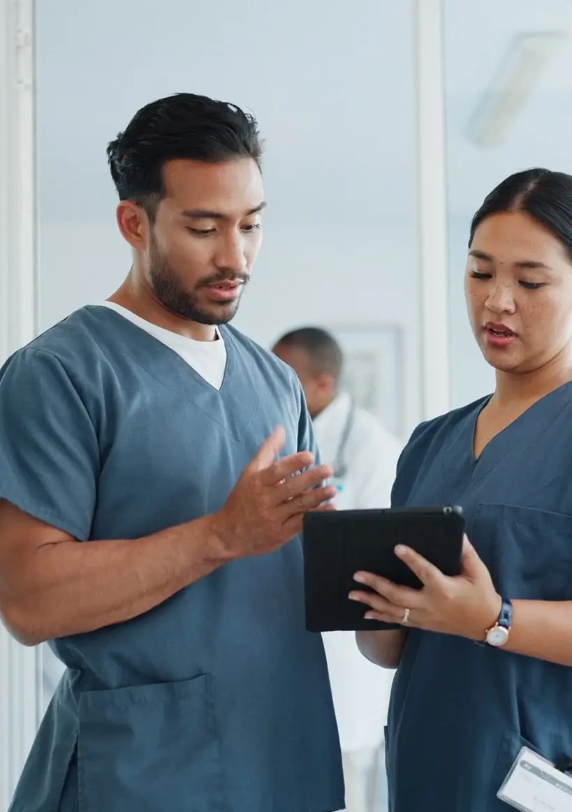 Medical professionals reviewing documents