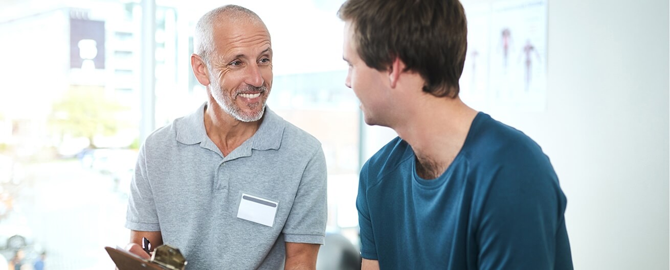 Man meeting with medical provider