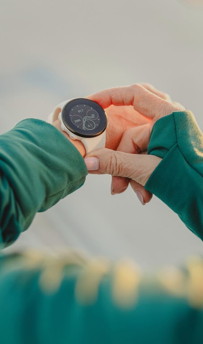 Person checking fitness watch