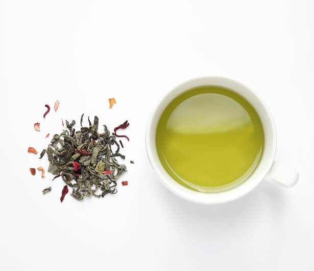 overhead view of brewed tea and tea leaves